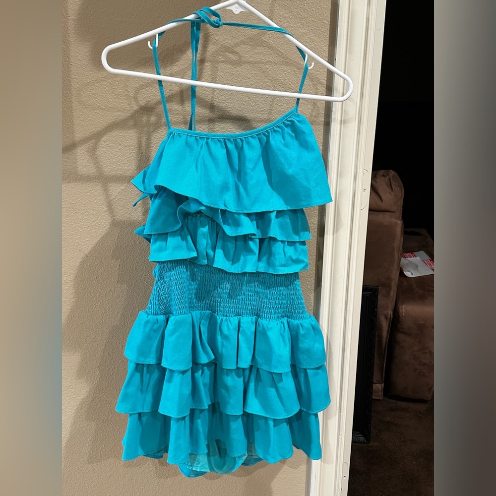 Super flattering teal romper!